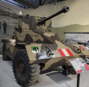 Green and brown tank vehicle at The Tank Museum in Bovington, Dorset.