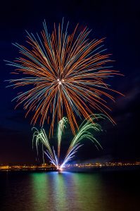 Fireworks over the sea.